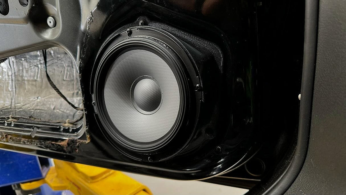 6.5-inch front speaker spacer installed in Holden Commodore VT–VZ door