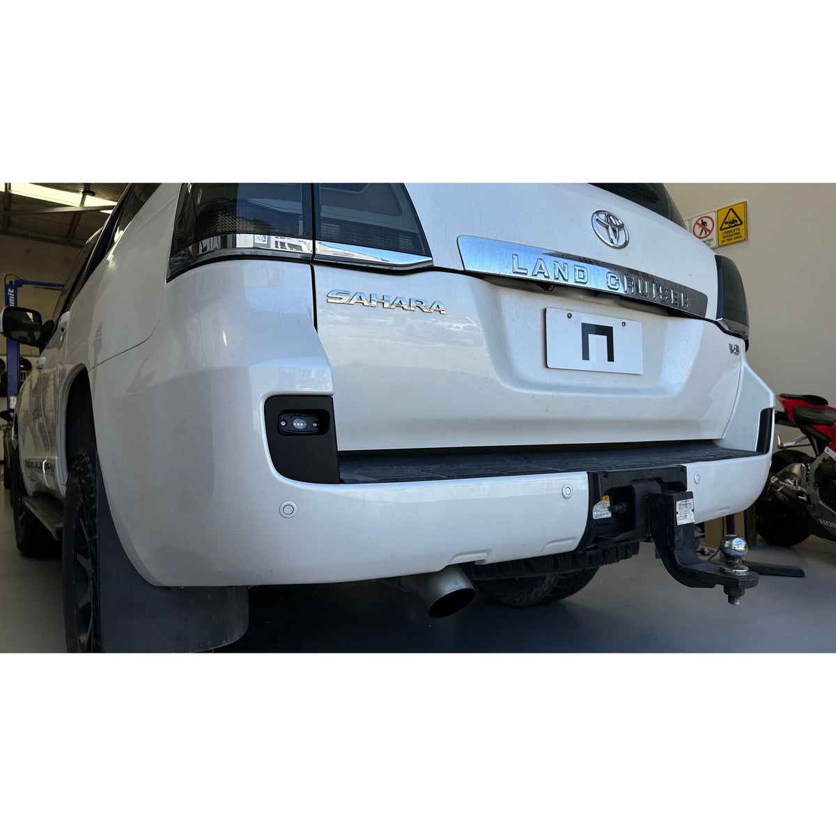 07-15 LC200 Rear Work Lights Bracket installed with ROK9 light in rear bumper