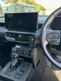 Hilux N90 UHF vent mount installed with GME XRS Connect handpiece — dashboard view