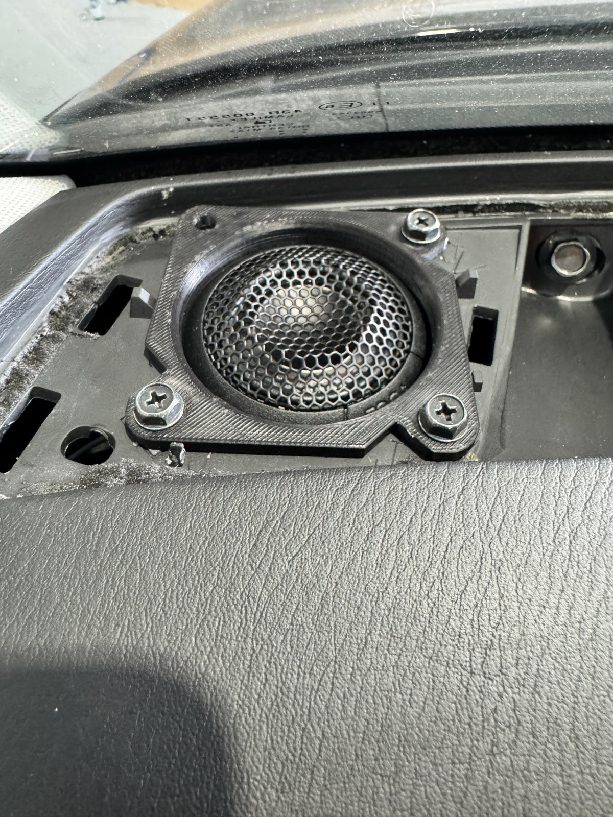 Focal K2 tweeter installed in Y62 Patrol dash — behind grille