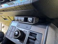 Installed in the N90 Hilux — side angle showing OZ logo and factory fit
