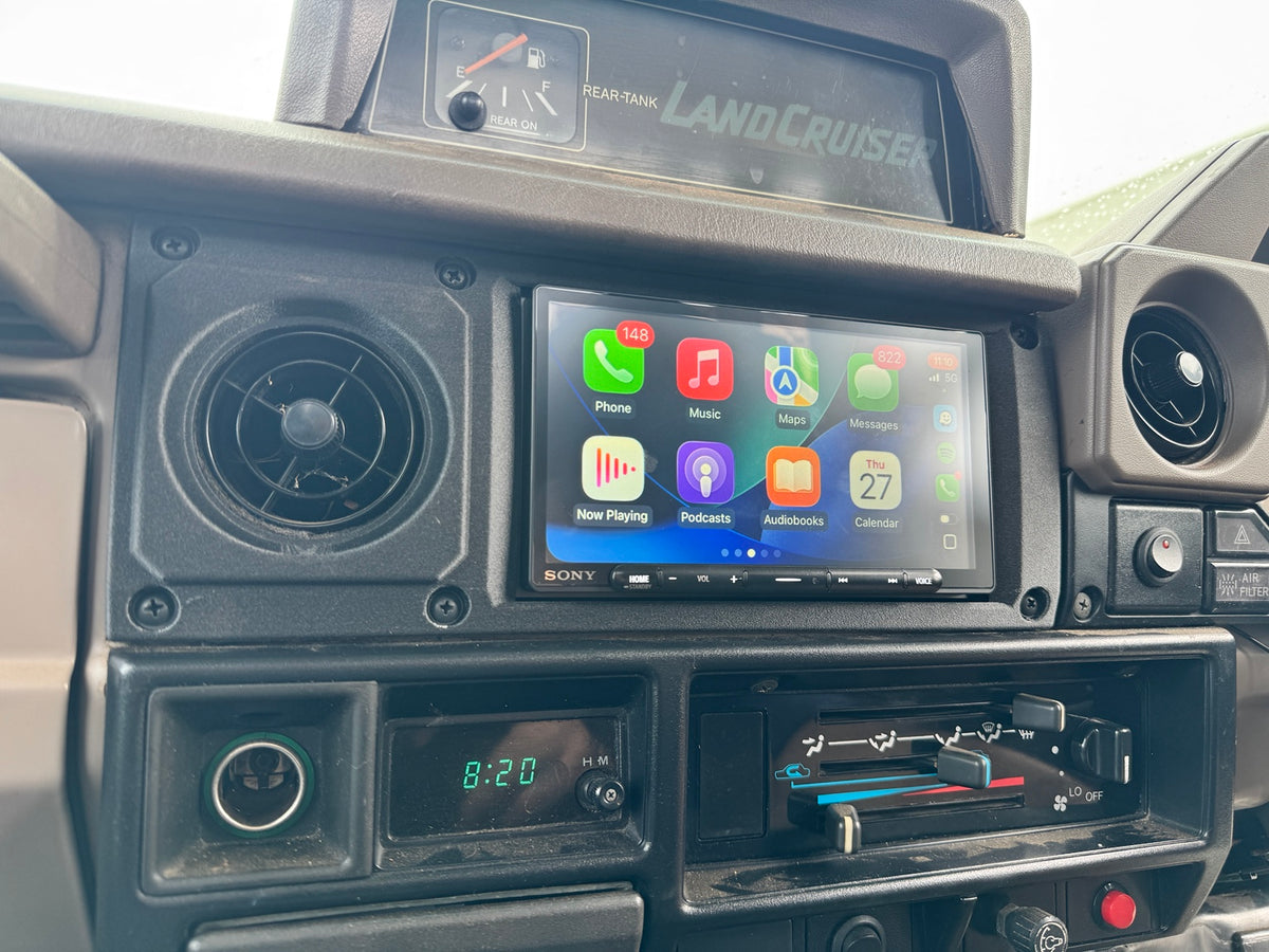 LandCruiser 70 Series steel dash double-DIN fascia installed with Sony head unit