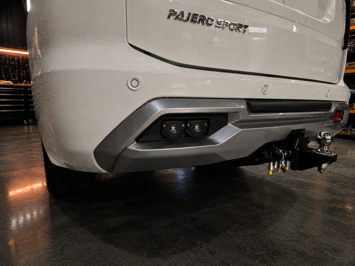 Pajero Sport rear work light brackets installed - close up
