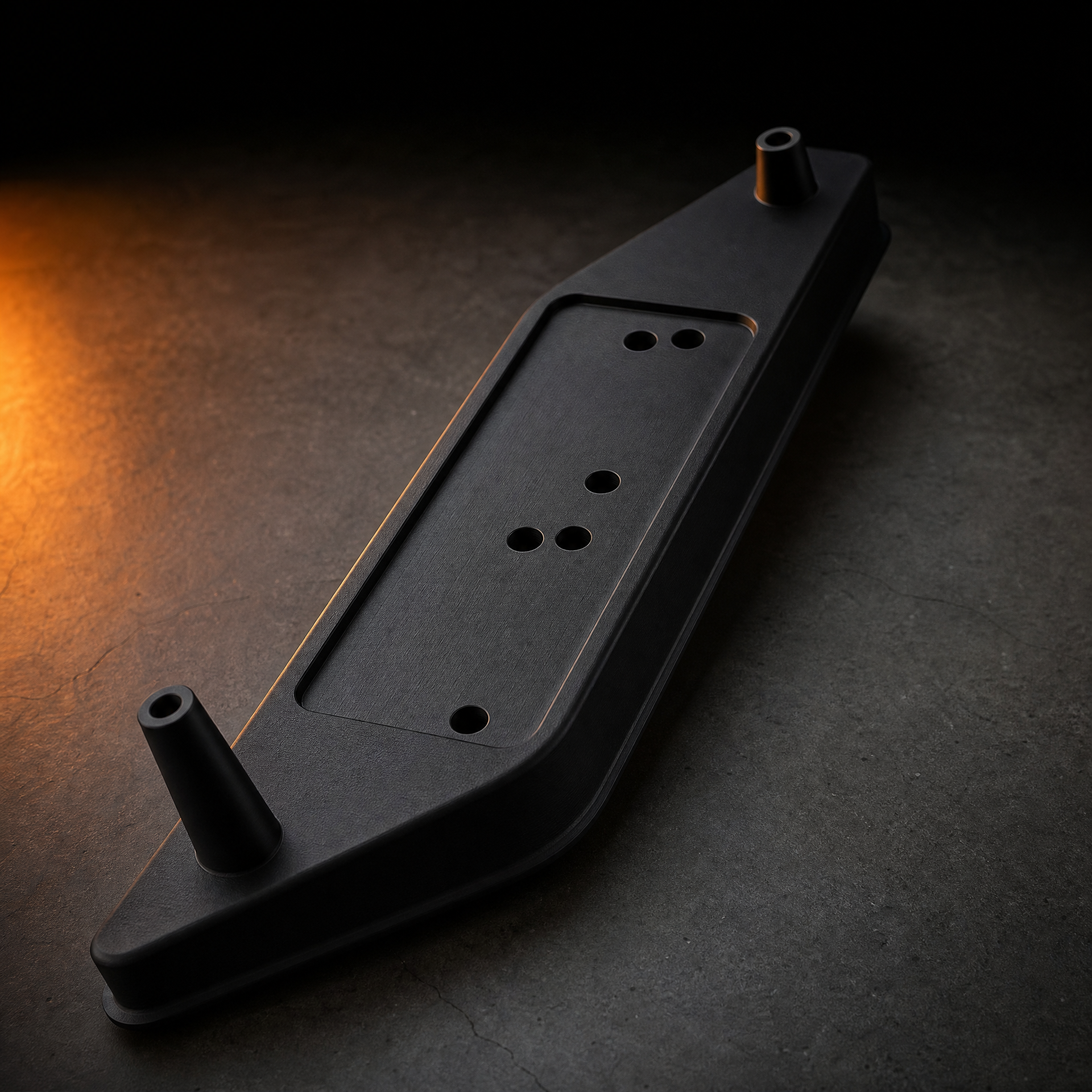 Top-down view of the bracket with orange accent lighting.